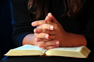 image of woman praying